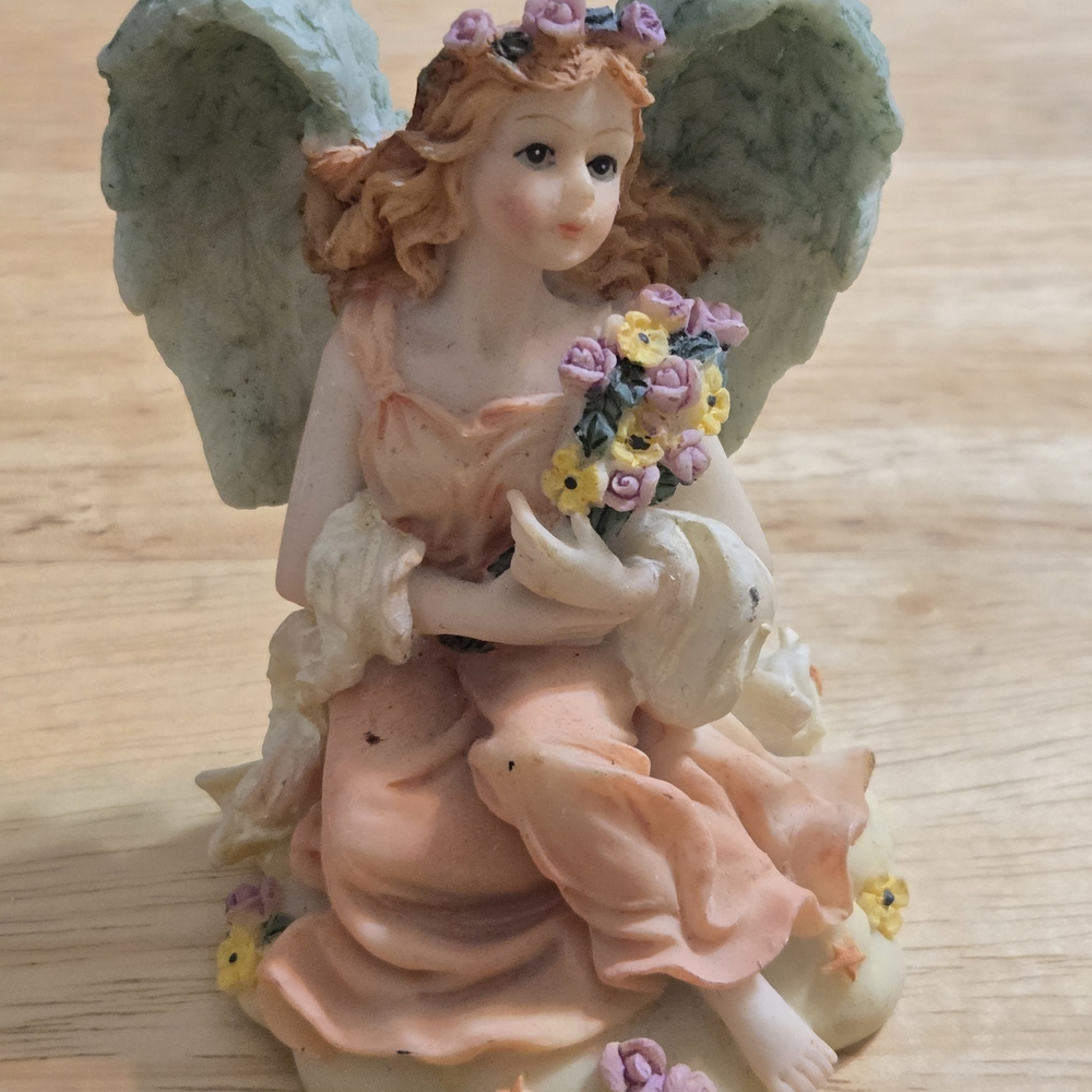 Ceramic Angel Figurine with Flowers